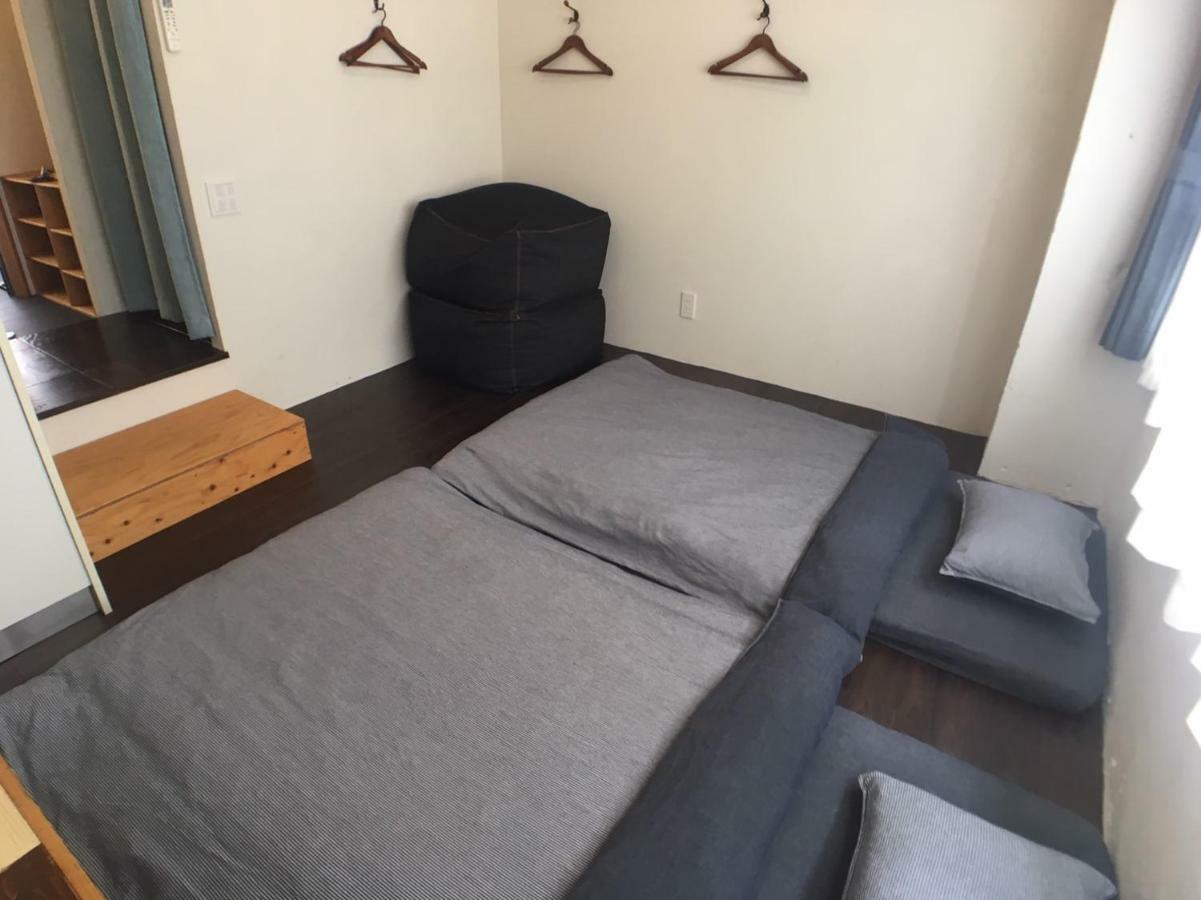 Guest House Golden Mile Hostel Амами Номер фото